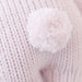Close-up of pink yarn with a textured pattern