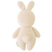 Knitted cream-colored bunny toy on a white background