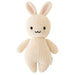 Knitted bunny toy on a white background