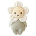 Knitted toy resembling a flower with a smiling face on a white background
