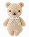 Knitted teddy bear with a robin's egg blue bow on a white background