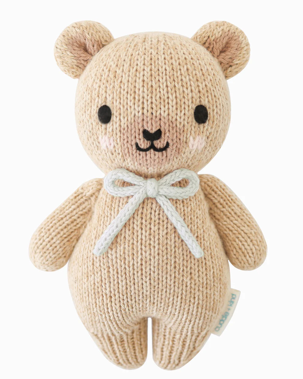 Knitted teddy bear with a robin's egg blue bow on a white background