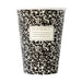 Black and white composition patterned paper cup with a label on a white background