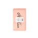 Pink soap bar with a label on a white background