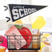 Decorative banner with 'first day of school' text above a basket with stationery items.