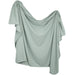 A sage green draped top with a textured, ribbed fabric and asymmetrical flutter sleeves, shown against a plain white background.