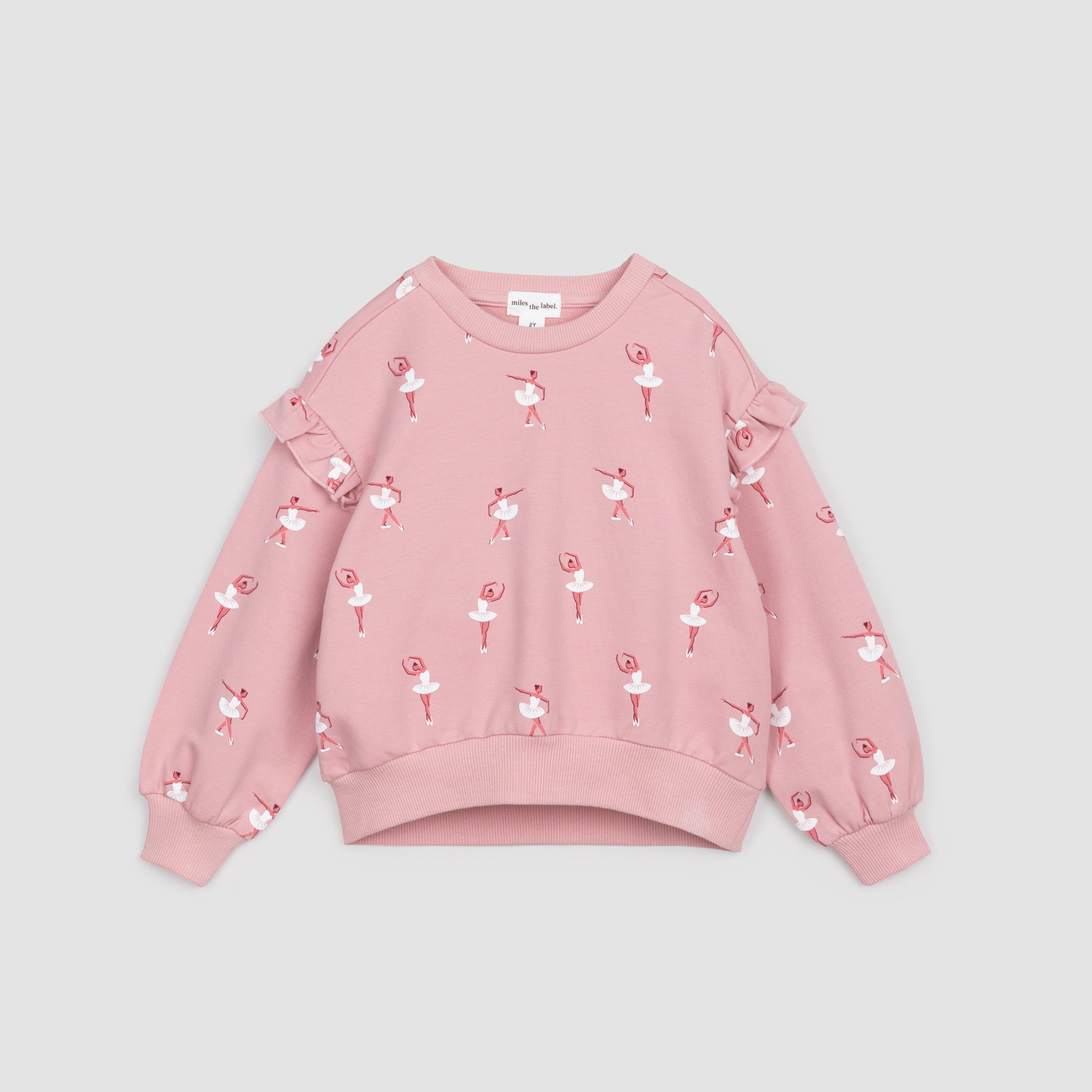 pink sweatshirt with ruffle detail on sleeve and all over ballerina print