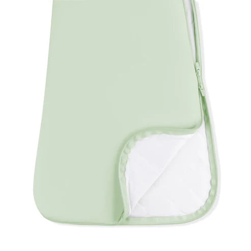 Light green baby sleep bag with a white interior on a white background