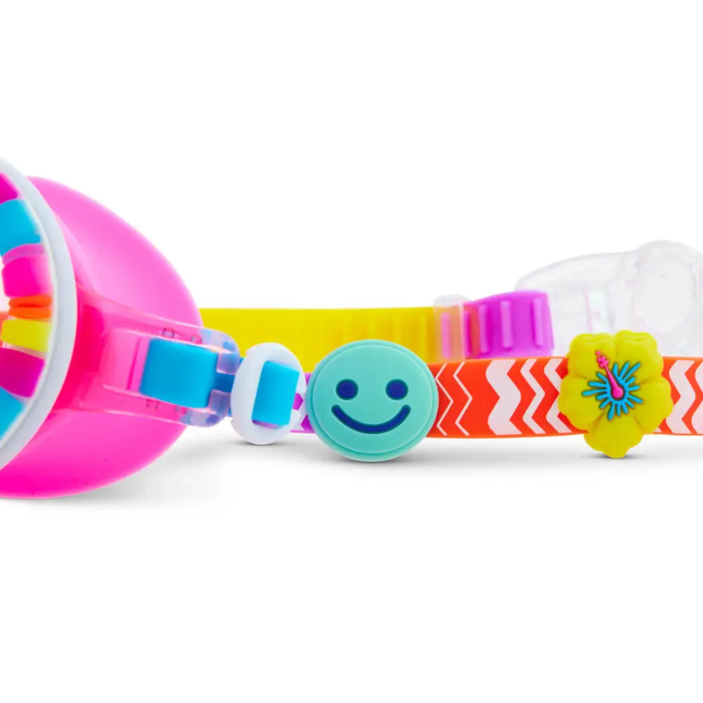 Colorful children's toy with a smiley face button on a white background