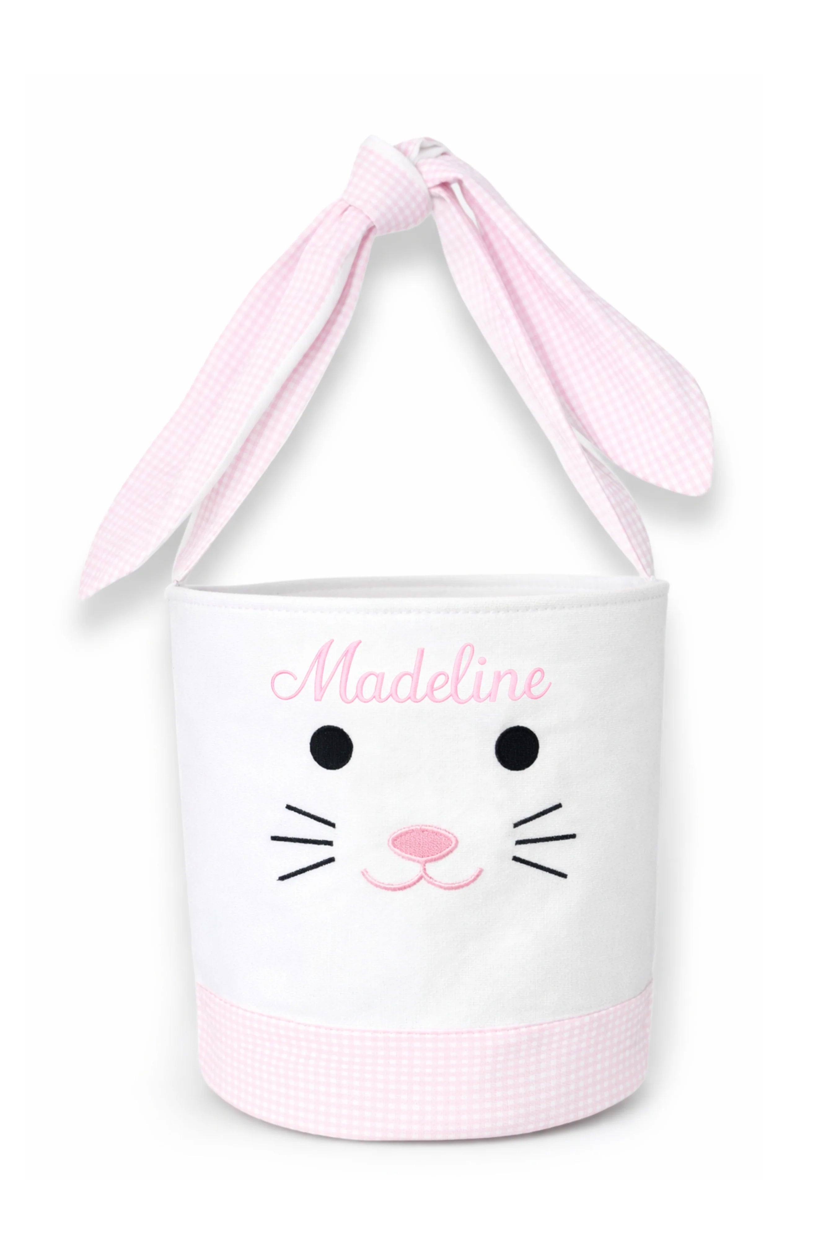 Easter basket with pink bunny ears and face design, personalized with 'Madeline'.