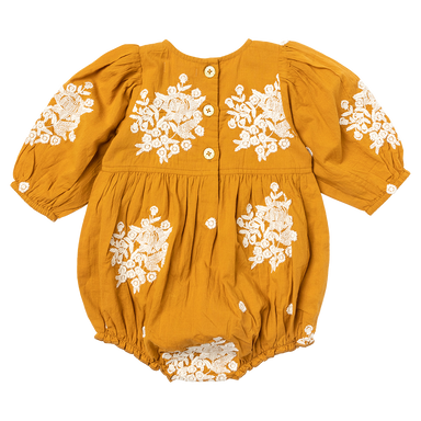 back of mustard yellow long sleeve bubble with white embroidered flowers and button closure