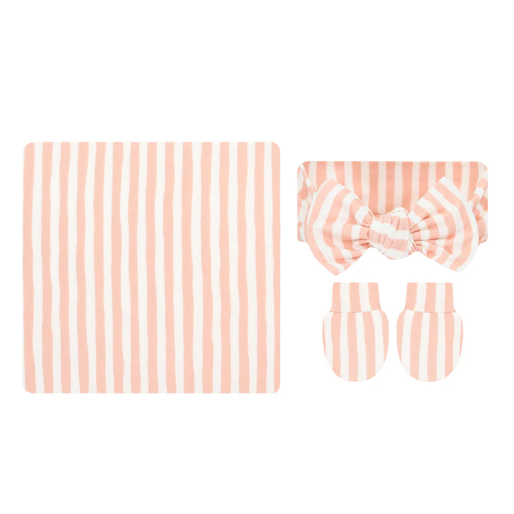 Baby accessories with orange striped pattern on a white background
