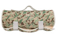 Camouflage-patterned nap mat with white trim on a white background