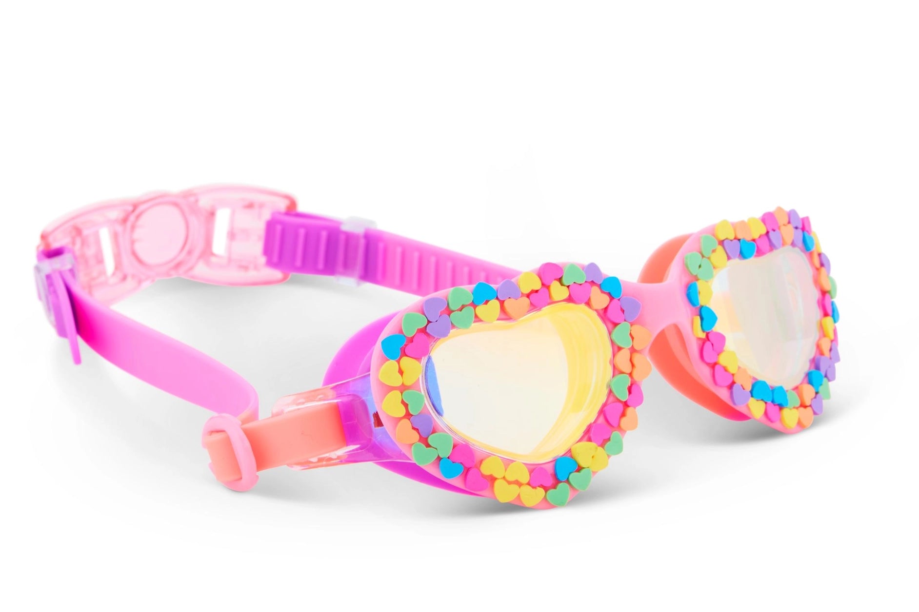 Colorful swim goggles with heart-shaped lenses on a white background