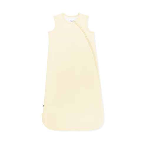Light yellow sleep bag on a white background