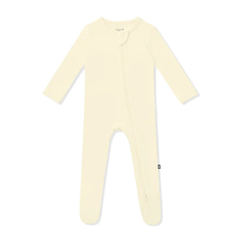 Cream-colored baby onesie with a small logo on a white background