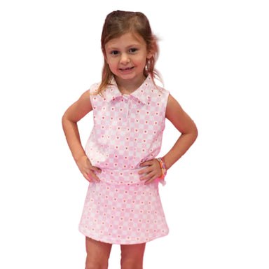 Young girl in a pink and white checked dress 