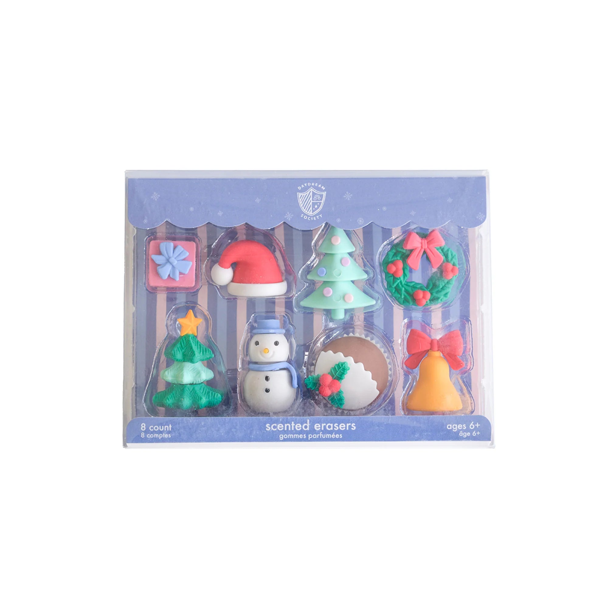 A boxed set of six Christmas-themed scented erasers in clear plastic packaging with a light blue label. The erasers include a snowman, Christmas tree, wreath, bell, gift box, and snow hat, in pastel colors.
