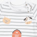 A close-up of a baby long-sleeve shirt with gray and white horizontal stripes, featuring embroidered farm animal faces (a pig and a cow) and part of an orange barn on the front.