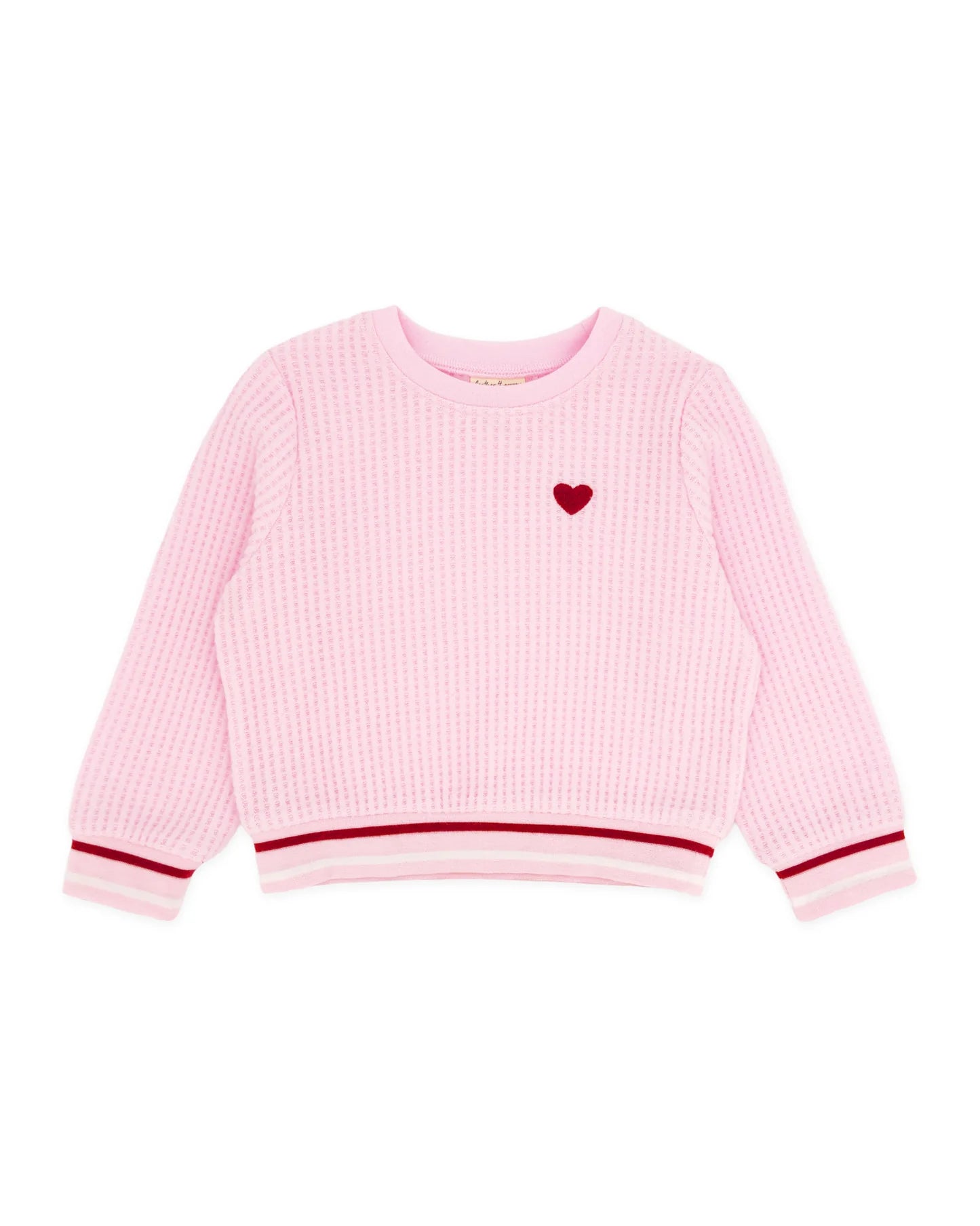 A pink waffle-knit long-sleeve sweater with a small red heart on the left chest, featuring red and white striped ribbed cuffs and hem, shown on a plain white background.