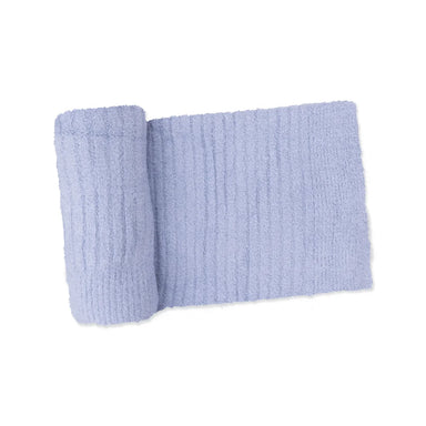Dusty blue chenille blanket on a white background