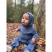 toddler boy wearing heathered navy long sleeve romper with hood