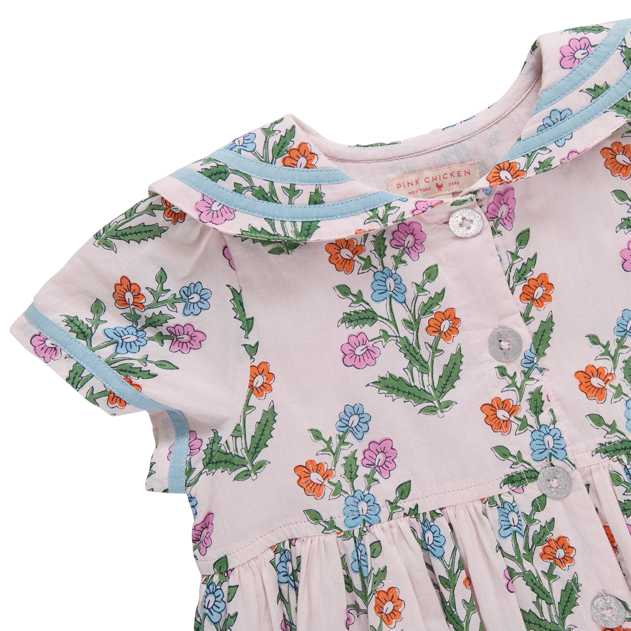 Children's dress with floral pattern on a white background