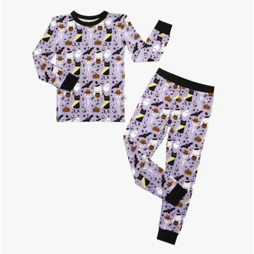 long sleeve pajama set in purple spooky cute pattern with ghosts, skeletons, cats and bats