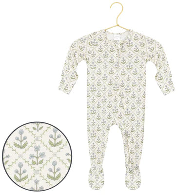 Baby onesie with floral pattern on a hanger against a white background