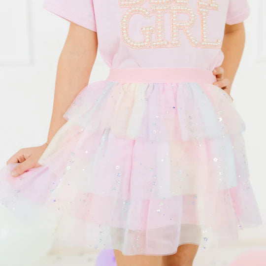 Pastel-colored dress with 'GIRL' text on a white background