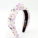 Decorative headband with Halloween ghost characters on a white background