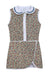 A sleeveless children's dress with a dense floral print on a green background, featuring a white Peter Pan collar with blue trim, a white front placket, and white piping details.