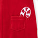 Red jumpsuit with a candy cane design on the back pocket against a white background