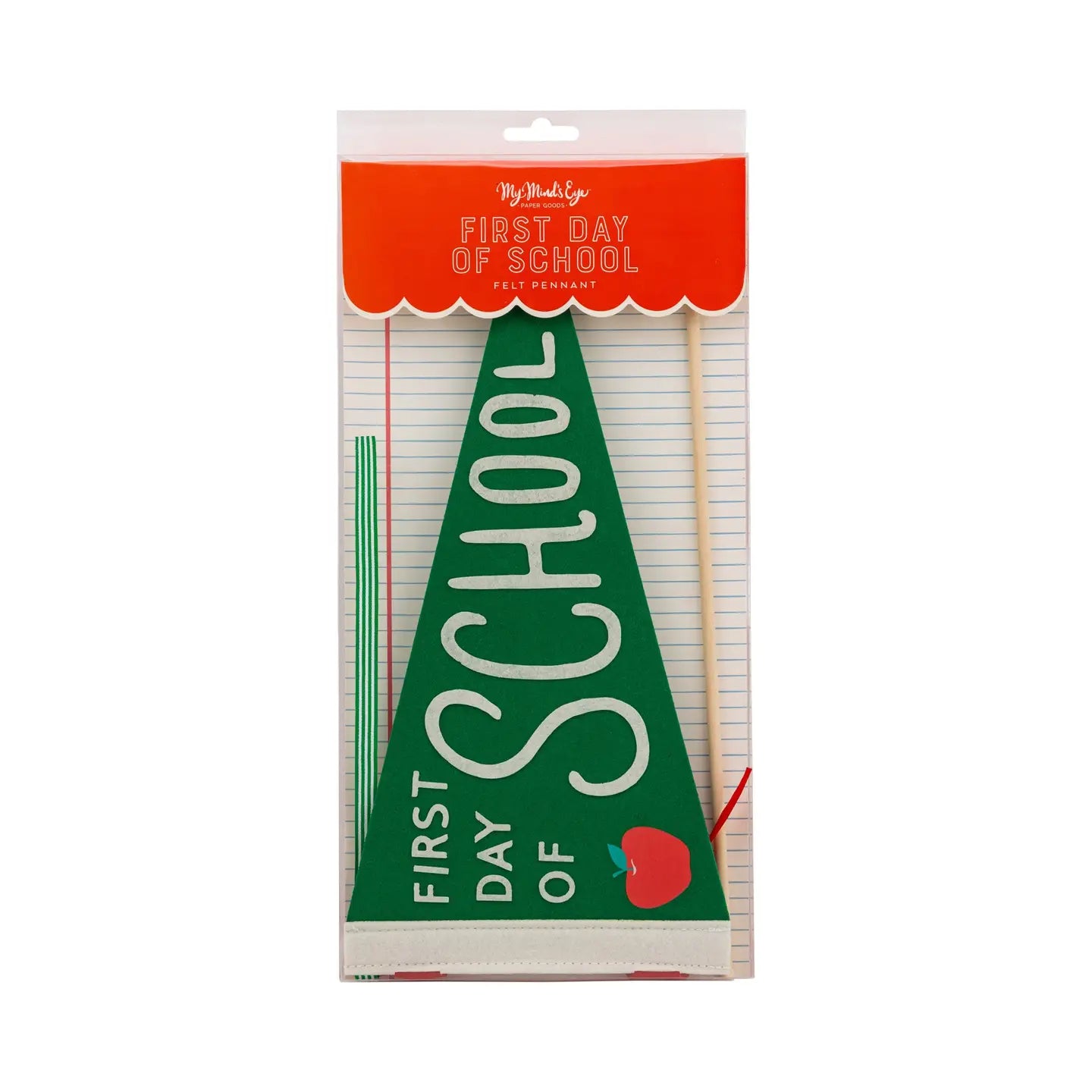 Green felt banner with 'First Day of School' text and red apple in packaging on a white background