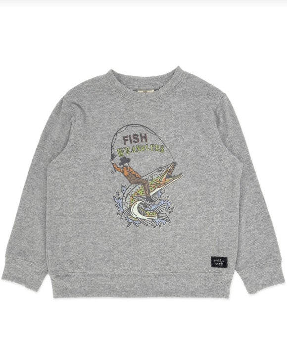 A heather gray crewneck sweatshirt featuring a vintage-style graphic of a fisherman holding a fishing rod with the words 'FISH WEARABLE' above a large fish. A small black brand tag is visible on the lower right hem.