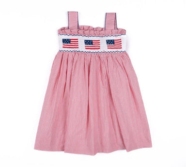 Pink striped dress with American flag design on a white background