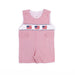 Red and white striped romper with American flag design on a white background