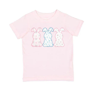 Pink t-shirt with colorful bunny design on a white background