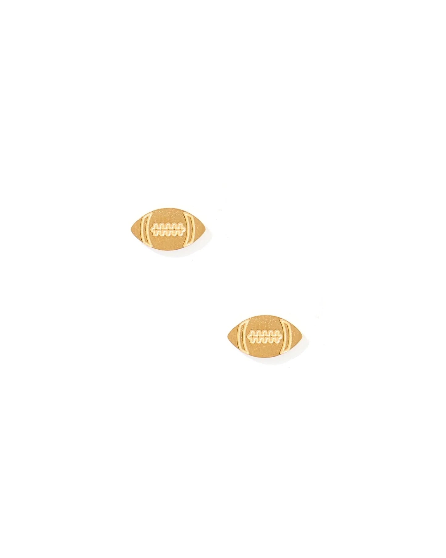 Two gold football-shaped earrings on a white background