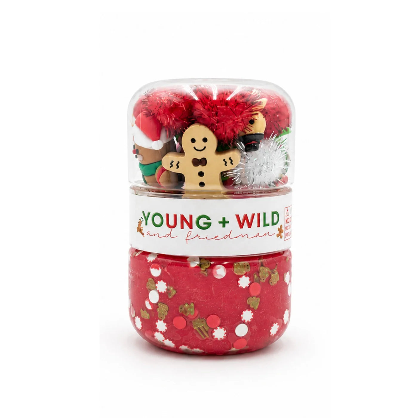 Red gingerbread sensory dough jar with festive holiday charms and pom poms in a clear top compartment from Young Wild and Friedman