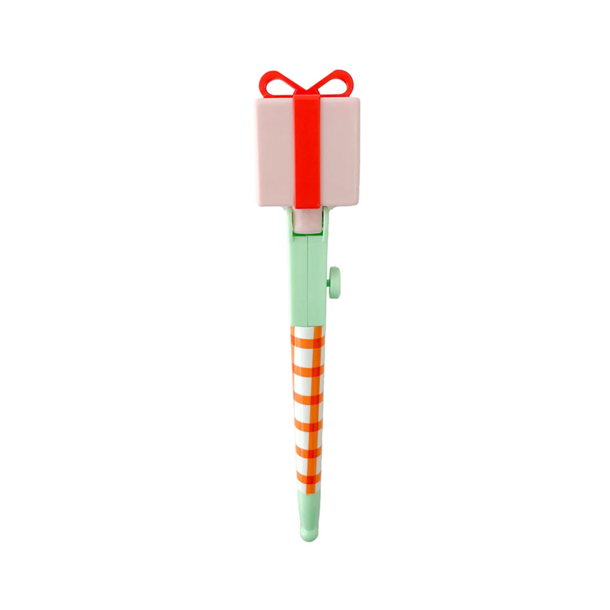 A novelty pen shaped like a gift box, featuring a pale pink box with a red ribbon and bow on top, a mint green body, and orange-and-white diagonal stripes on the lower section, shown against a plain white background.