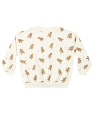 White sweater with gingerbread pattern on a white background
