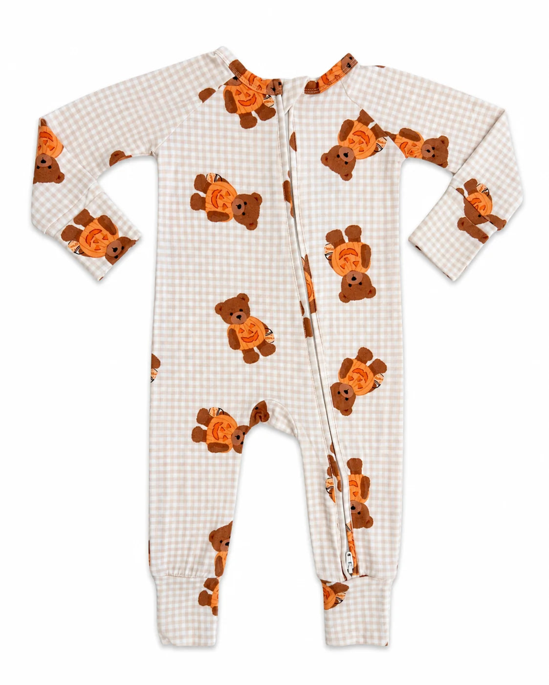 A baby long-sleeve footless one-piece sleeper with a brown and orange teddy bear print over a beige and white gingham pattern, featuring a front zipper.