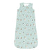 A sleeveless baby sleep sack in a light mint green color, featuring an all-over repeating print of golf players, golf carts, and golf clubs. The garment is displayed flat against a solid white background.