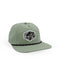 A snapback hat with a fish emblem