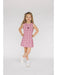 Young girl wearing a maroon A&M dress on a light gray background