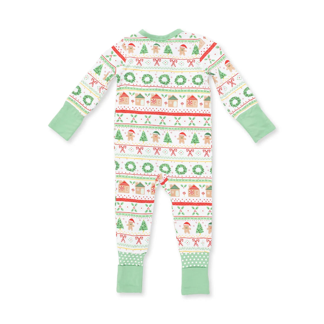 A baby's long-sleeve footed pajama romper shown from the back, featuring a festive Christmas holiday print with gingerbread men, wreaths, and houses in green, red, and beige on a white background, with solid light green cuffs and collar.