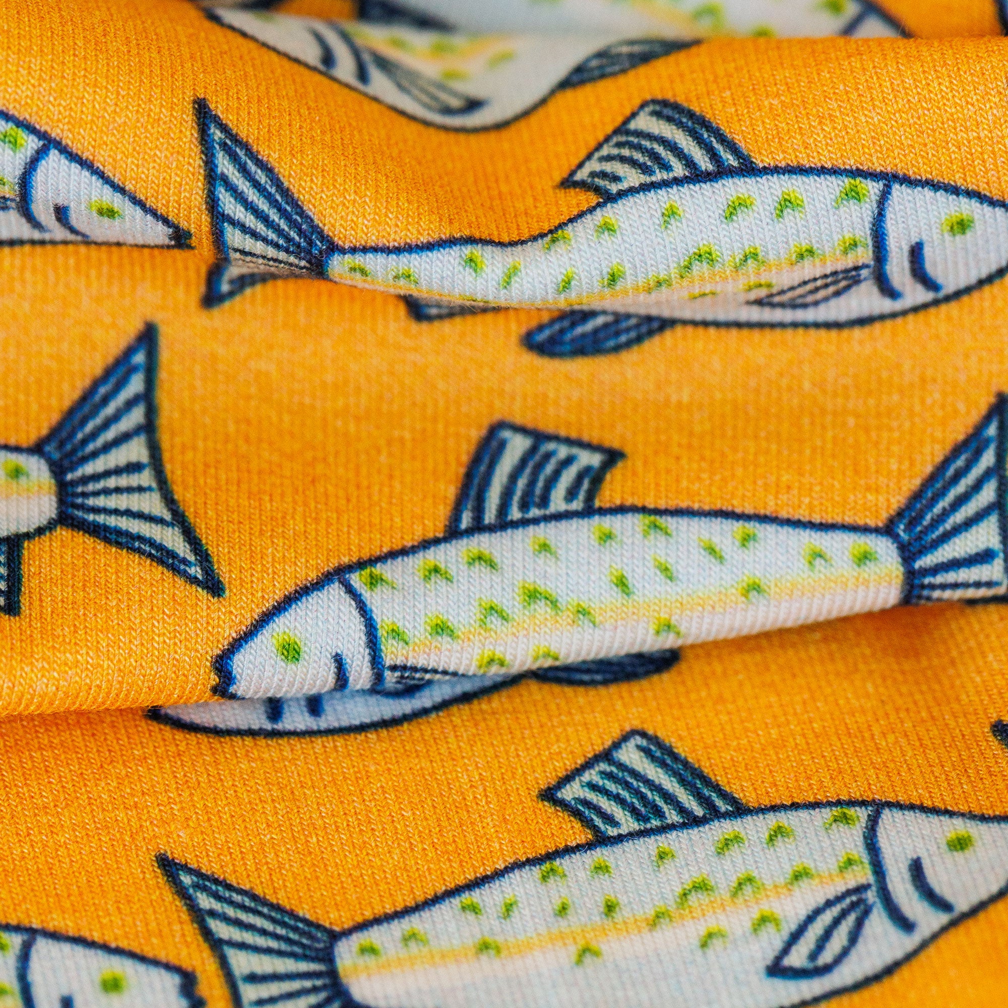 Fish pattern on orange fabric