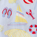 Fabric with nautical-themed patterns including a sailboat, flip-flops, and lobster.