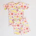 Girl's loungewear set with beach-themed print on a light gray background
